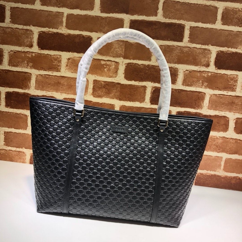 G*u*i shopping bags